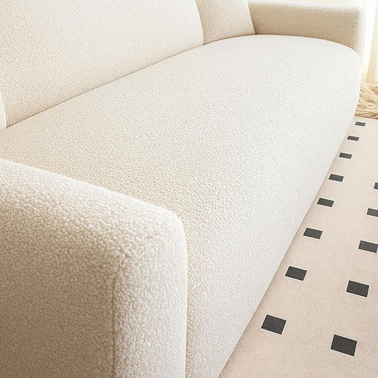 Divano confortevole con braccioli rivestimento boucle nero